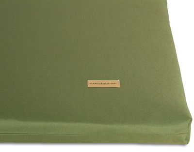 close up of green waterproof dog crate mat