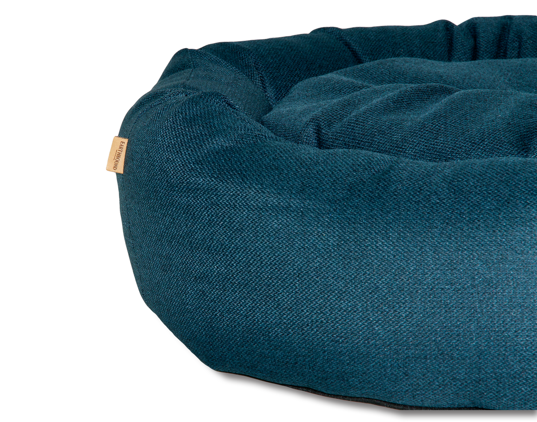 Close up of breton blue donut morland dog bed