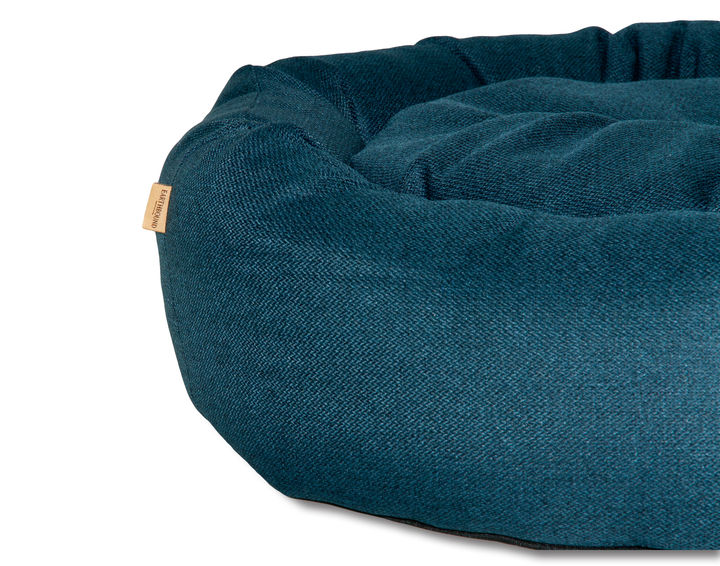 Close up of breton blue donut morland dog bed