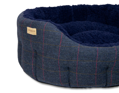 Close up of traditional tweed navy classic dog bed