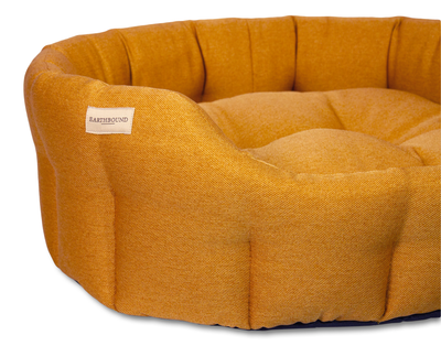 Close up of camden apricot classic dog bed