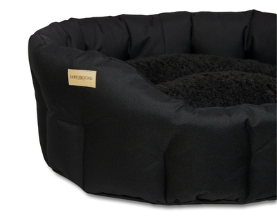 Close up of black waterproof classic dog bed