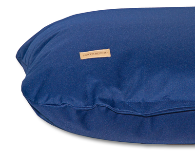 Close up of a navy waterproof flat dog cushion