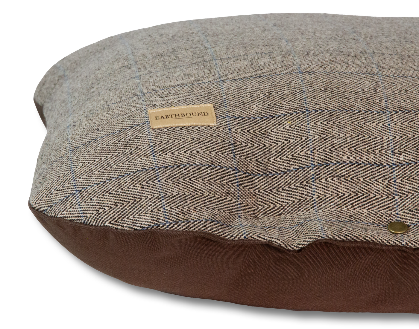 Close up of tweed beige flat dog cushion